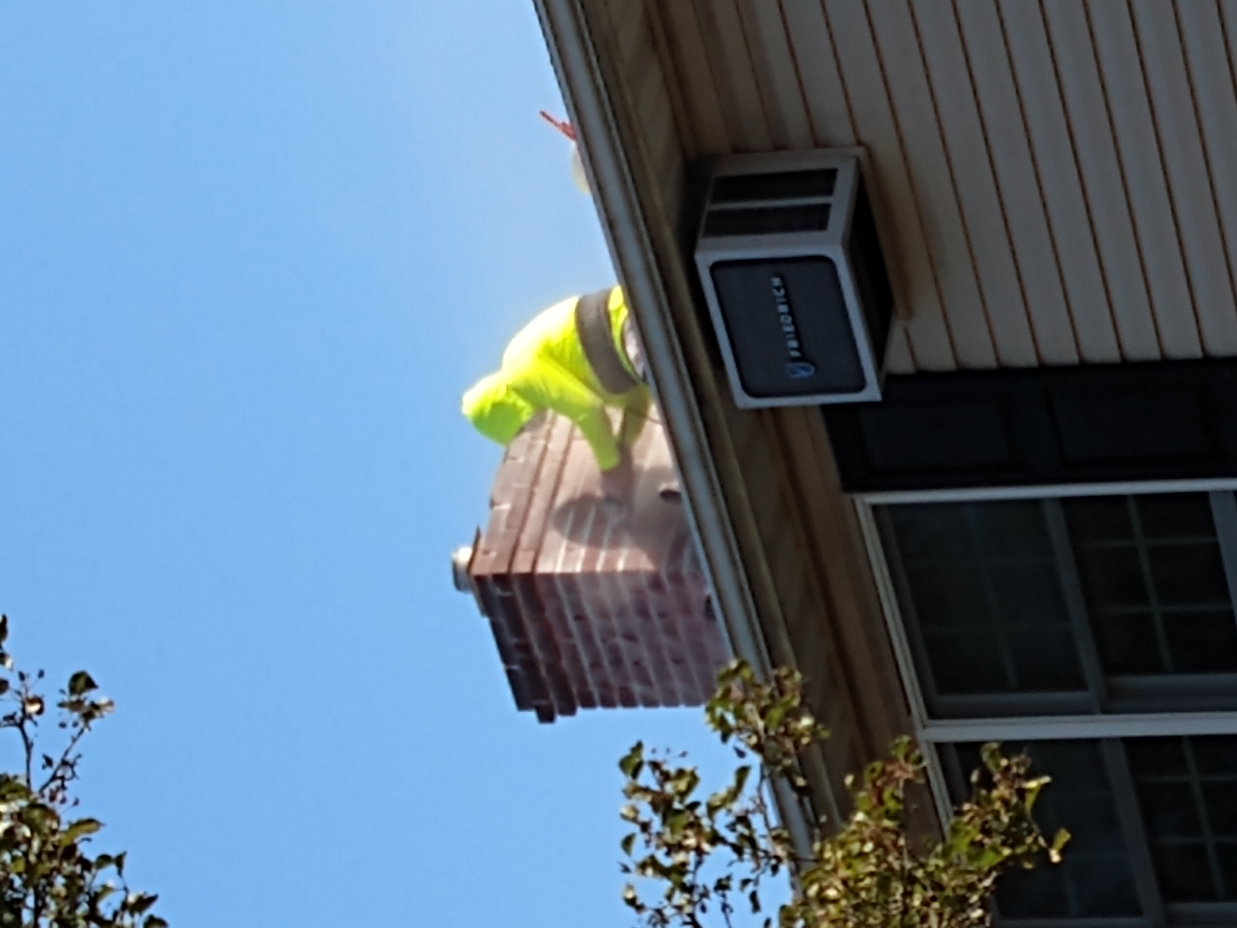 Chimney tuckpointing and mortar repair in Levittown, New York