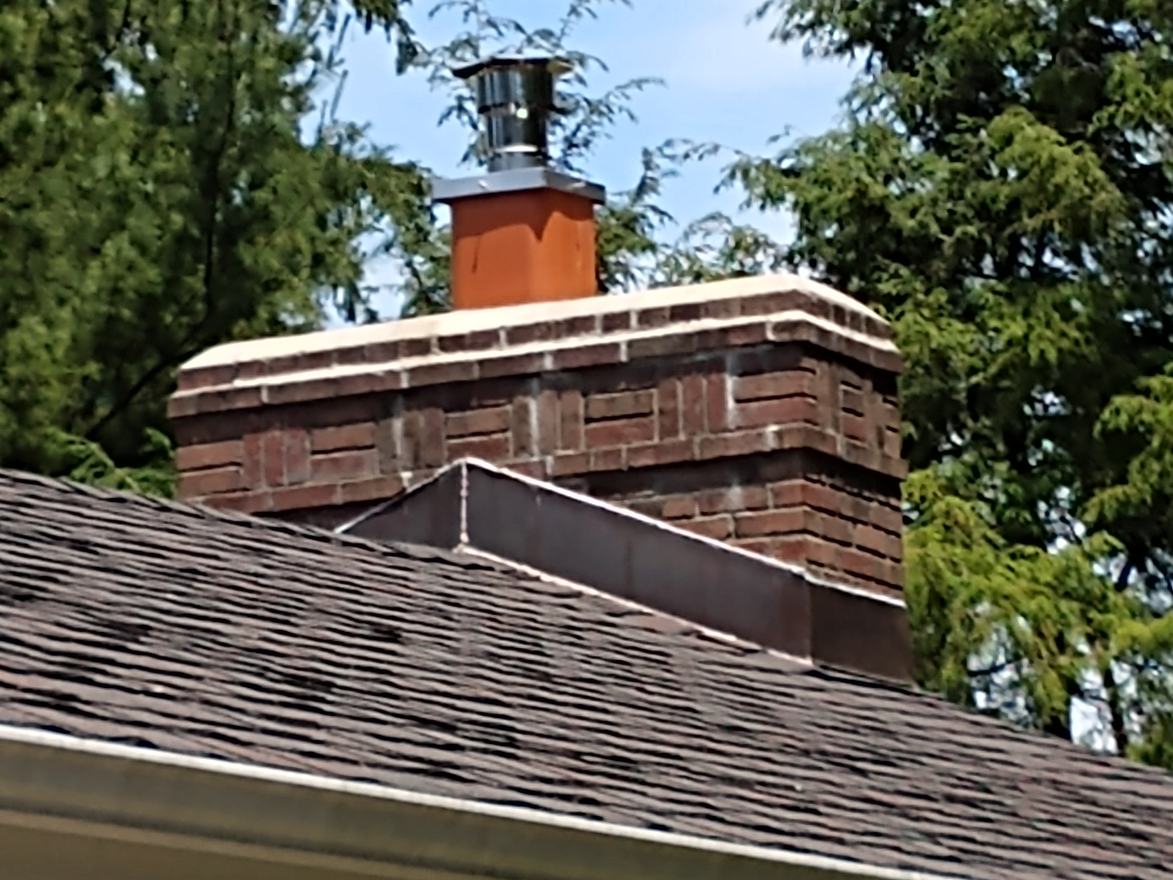 Stainless steel chimney cap with animal guard in Levittown, New York
